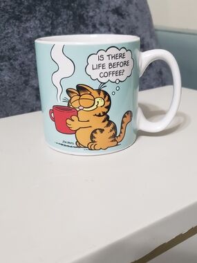 Garfield Ceramic Coffee Mug - Light Blue with Red Cup Design